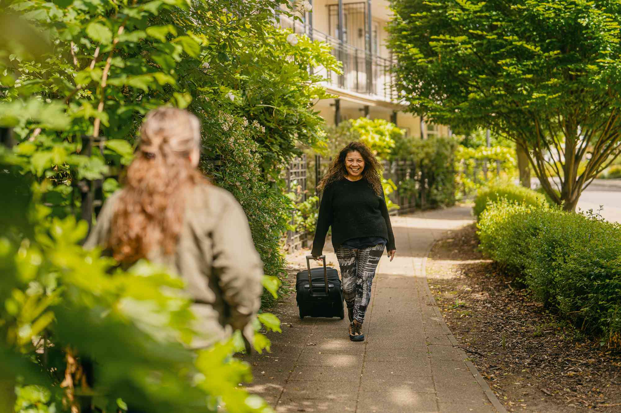 Carer arriving at someones home
